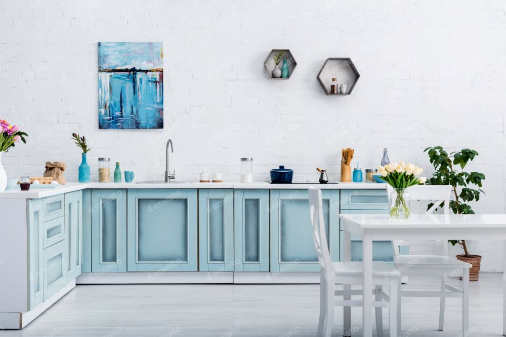 a blue and white kitchen with kitchen wall decor art