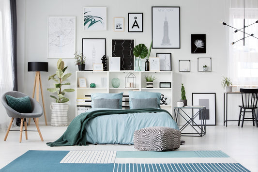 a modern bedroom with above bed wall decor ideas