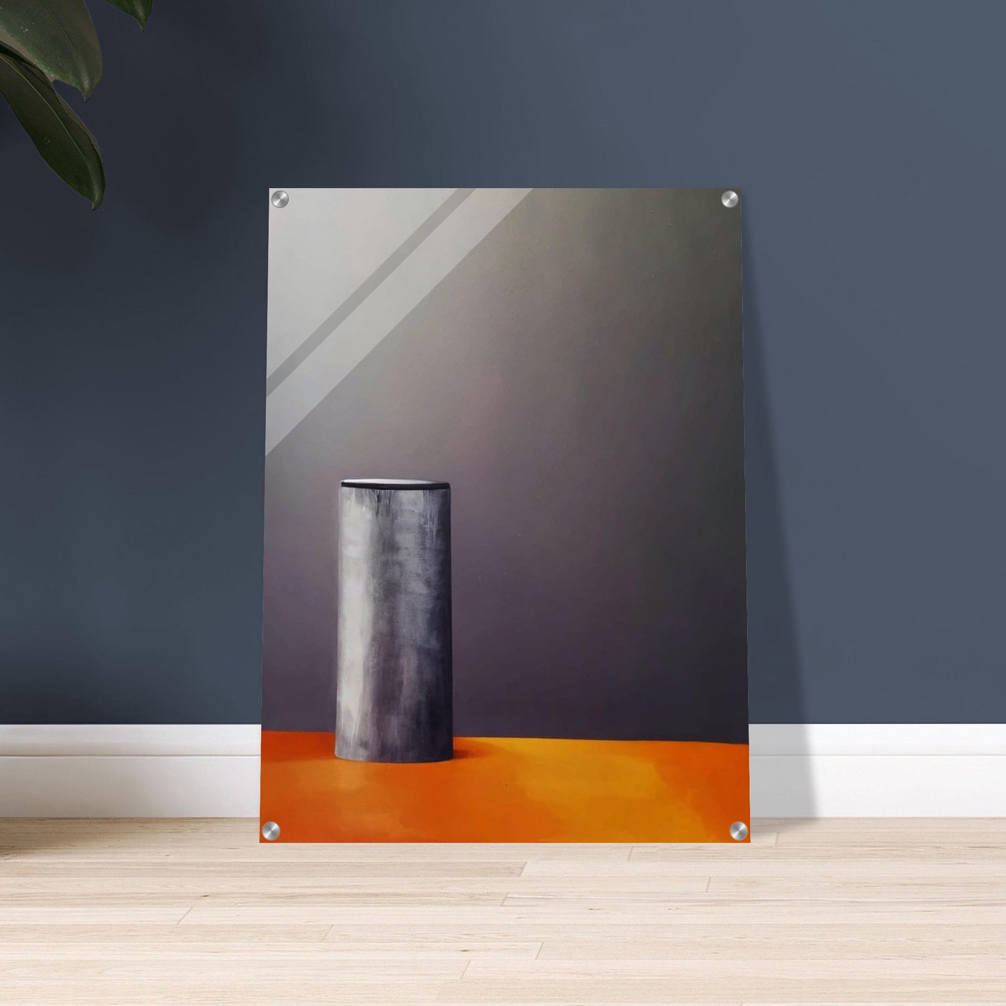 A minimalistic composition featuring a single cylindrical gray object standing on a warm orange surface against a dark, muted background, evoking stillness and simplicity.