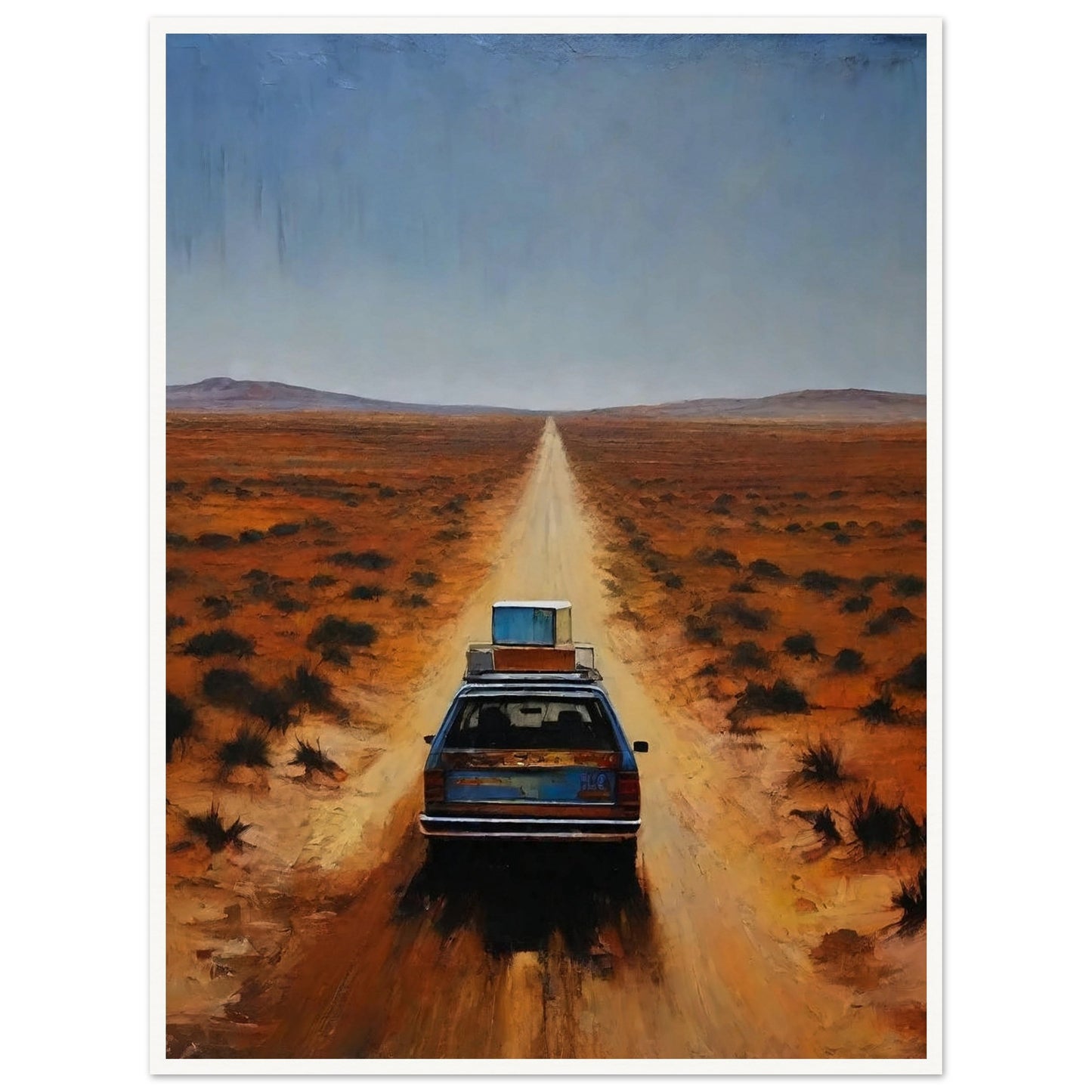 A car driving down a long, desolate road in a vast desert landscape under a clear blue sky.
