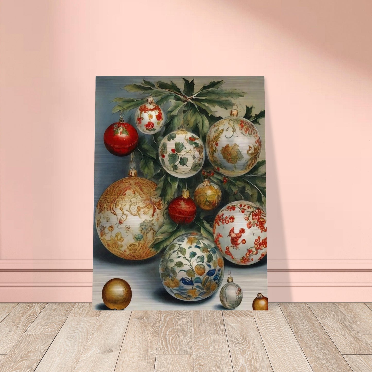 A collection of intricately designed Christmas ornaments in red, gold, and white, adorned with holly and floral patterns, hanging from green branches in an elegant holiday display.