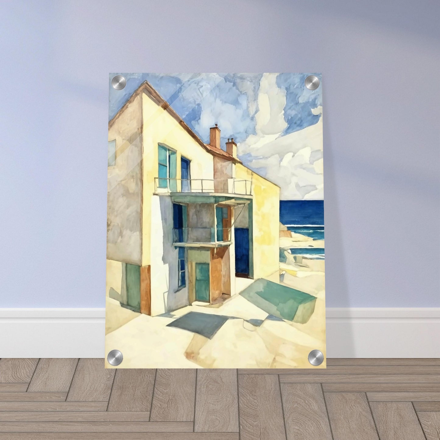 A bright seaside house casts long shadows under the afternoon sun, with a calm ocean and blue skies in the background.