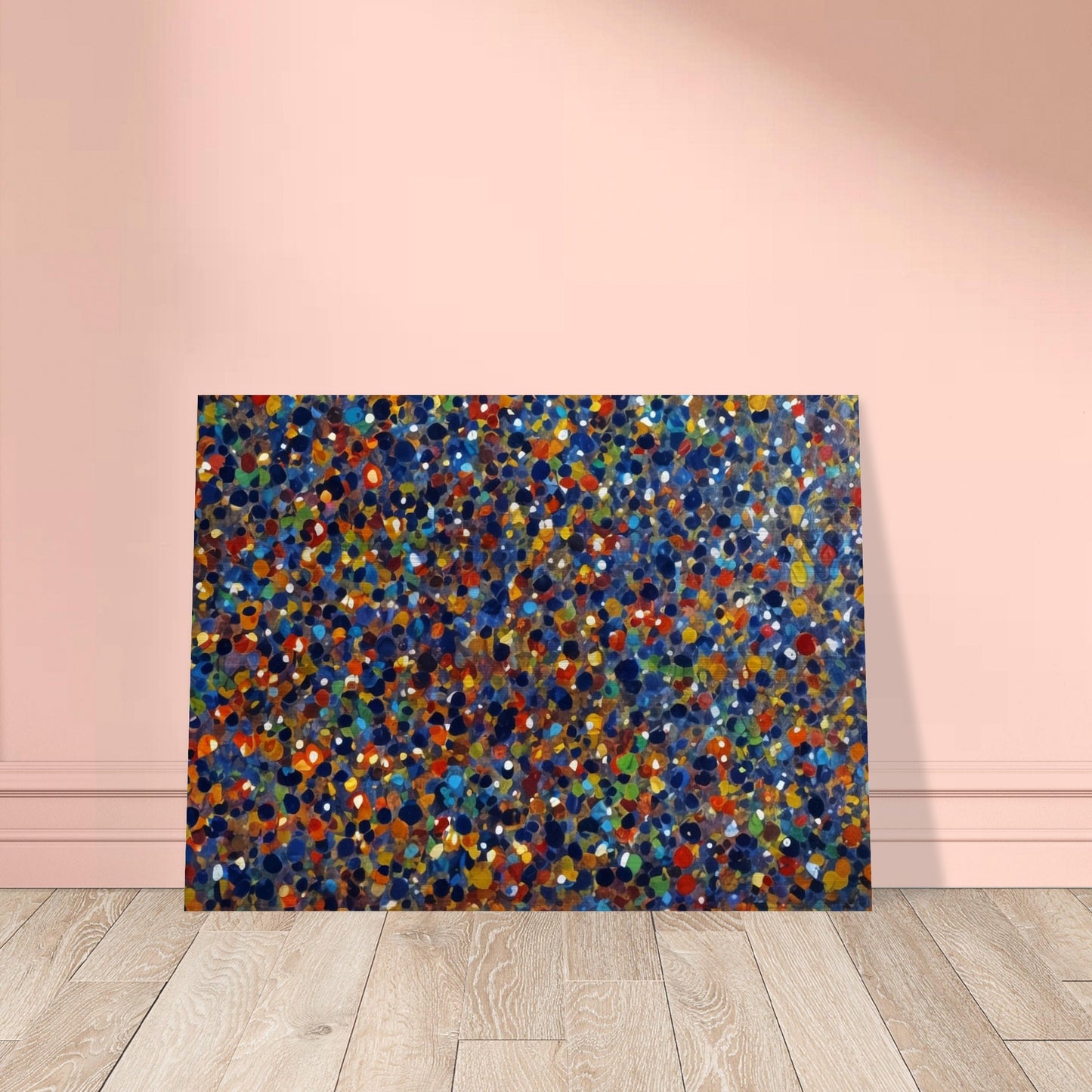 A dynamic display of colorful dots in various shades of blue, orange, green, and red, creating a vibrant and energetic pattern reminiscent of a starry sky or confetti.