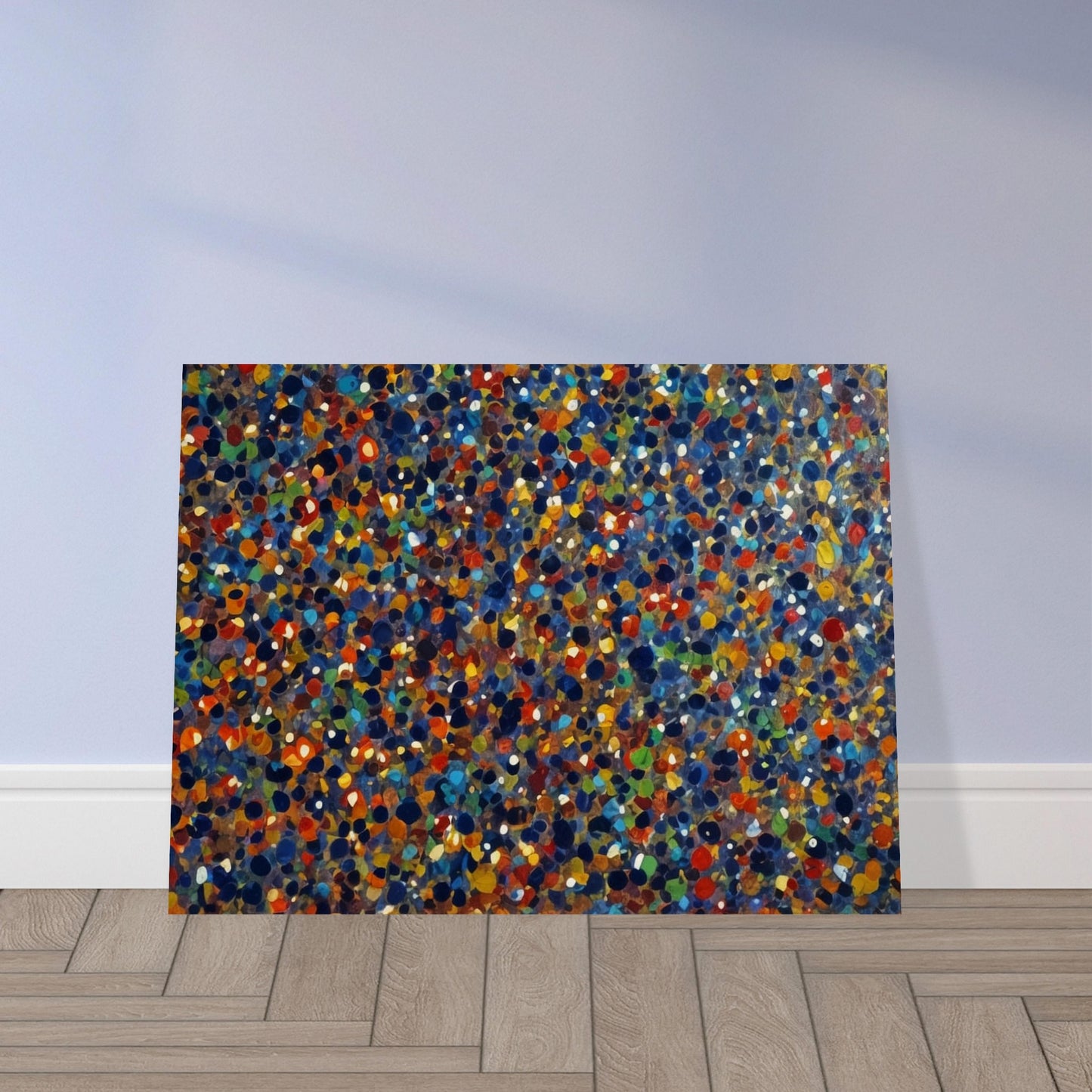 A dynamic display of colorful dots in various shades of blue, orange, green, and red, creating a vibrant and energetic pattern reminiscent of a starry sky or confetti.