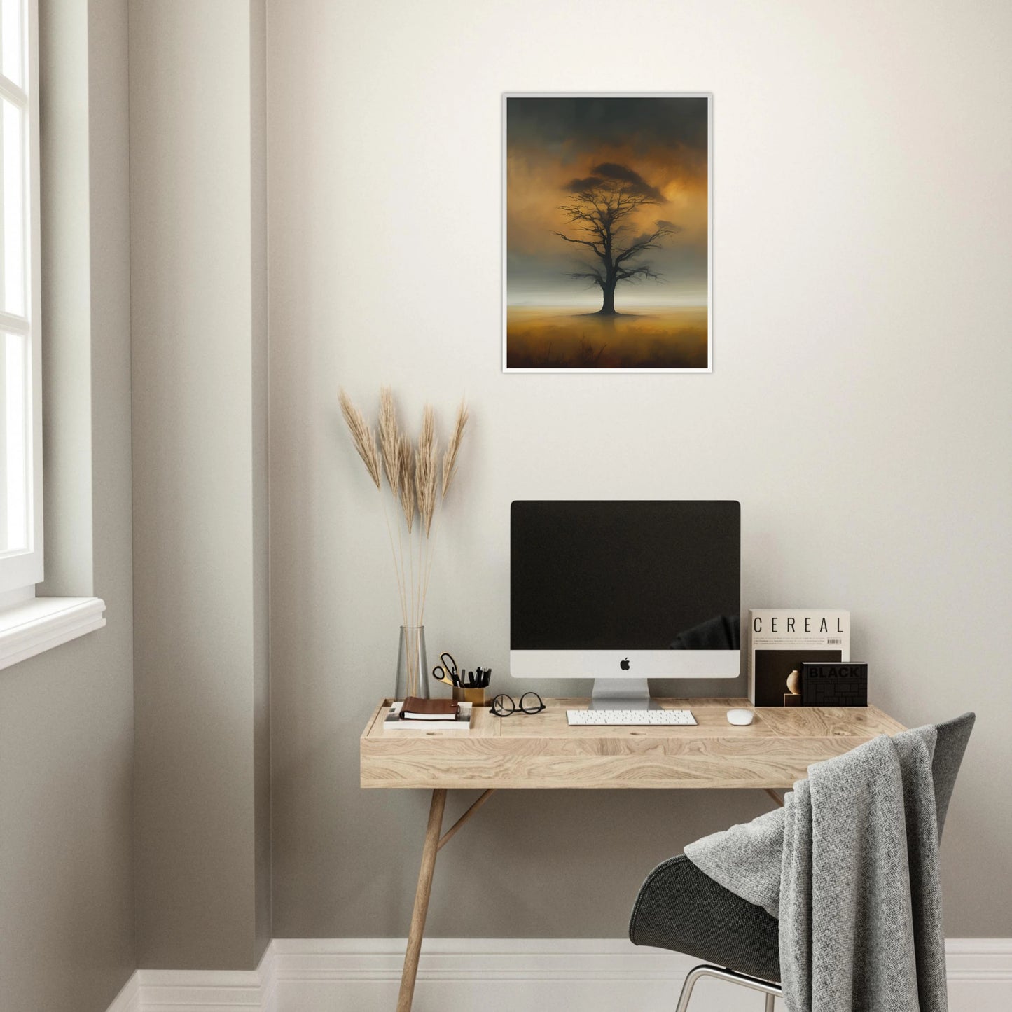 A solitary tree with bare branches stands in a foggy golden field, framed by a smoky, glowing twilight sky.