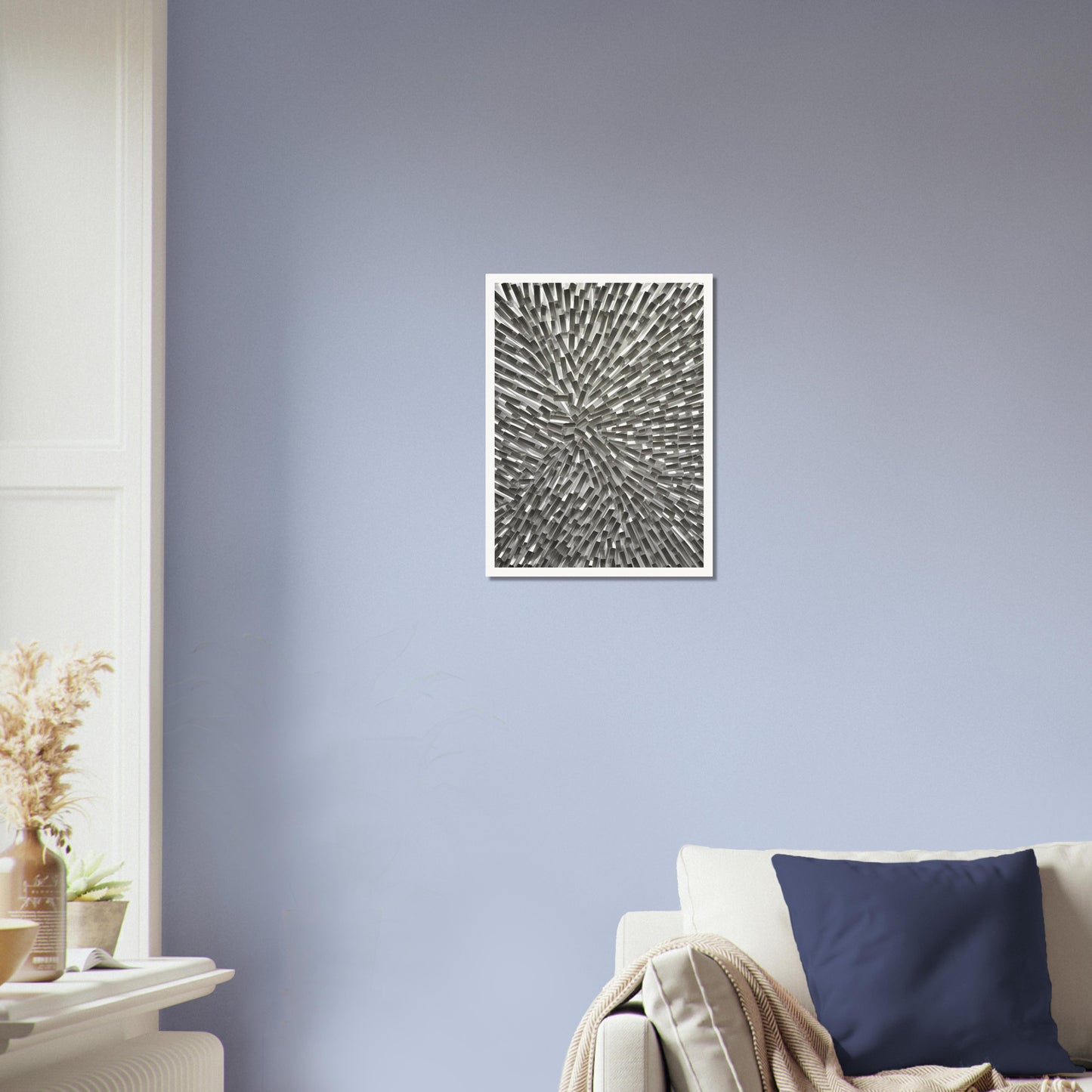 An abstract monochromatic artwork featuring a dynamic arrangement of geometric rectangular blocks radiating outward in a burst-like pattern.