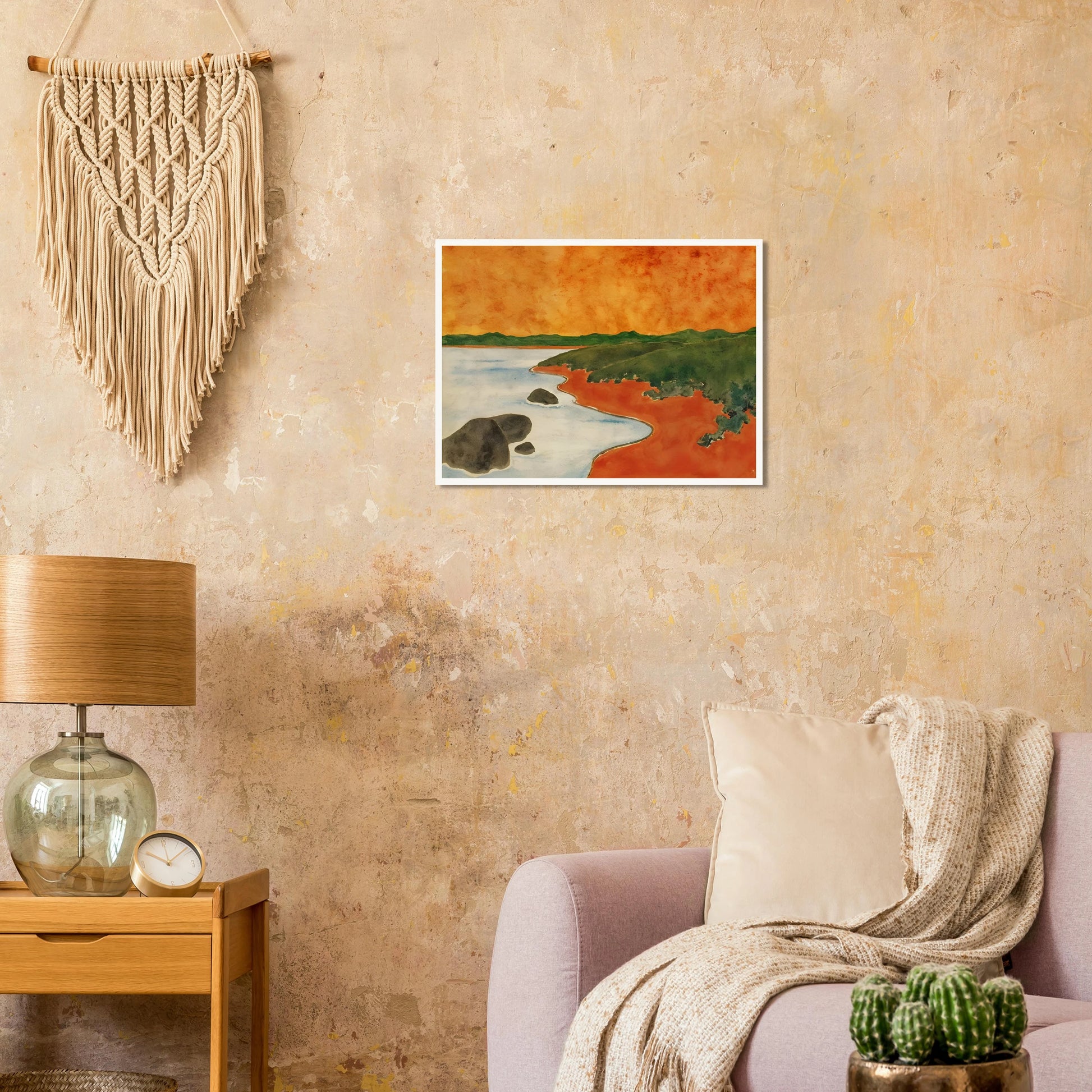 A vivid coastal scene with fiery orange skies, green hills, and calm shoreline waters meeting a winding red shoreline.