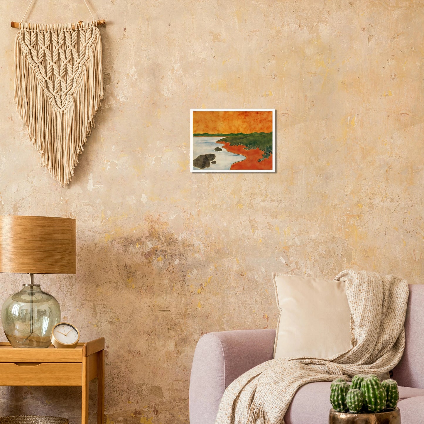A vivid coastal scene with fiery orange skies, green hills, and calm shoreline waters meeting a winding red shoreline.