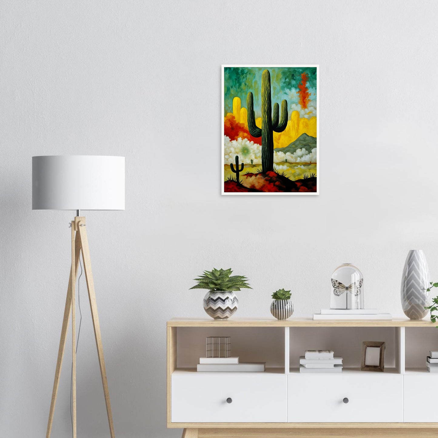 A striking painting of towering cacti set against a vivid desert sky, with swirling clouds, golden hues, and a distant mountain.
