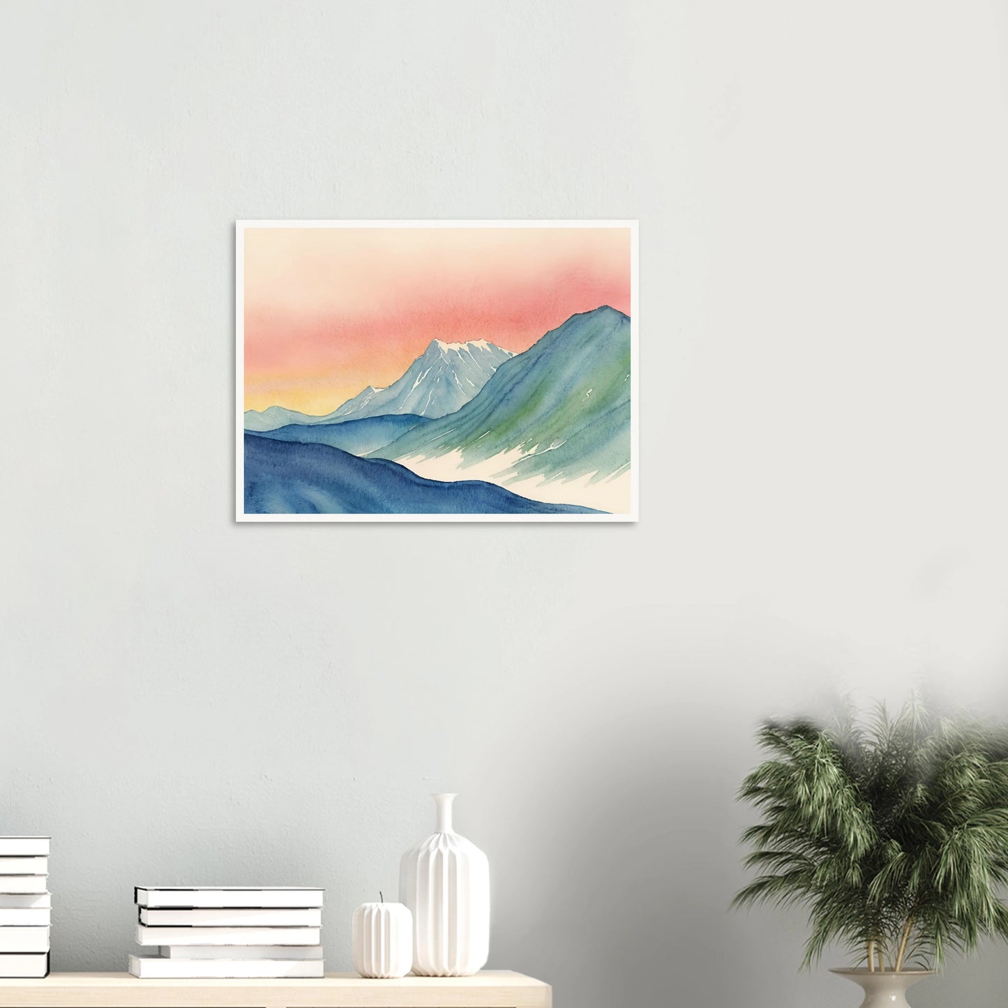 Cool-toned mountain ridges meet a radiant pink and yellow sky in this tranquil watercolor of a twilight alpine scene.