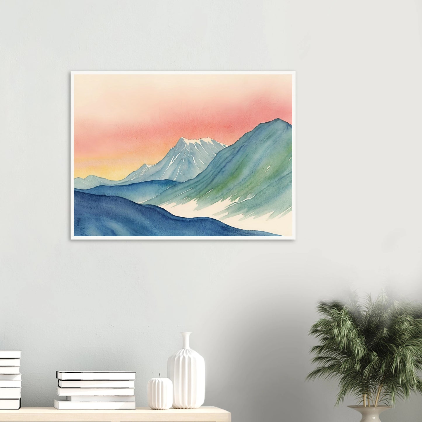 Cool-toned mountain ridges meet a radiant pink and yellow sky in this tranquil watercolor of a twilight alpine scene.