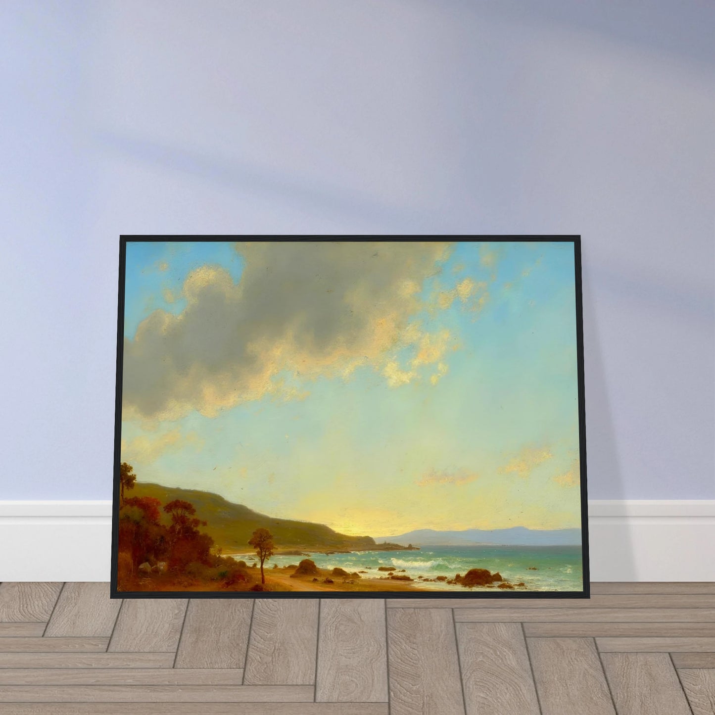 A sunlit coastal landscape with gentle waves meeting a golden shore, framed by rocky outcrops and distant hills under a vast sky.