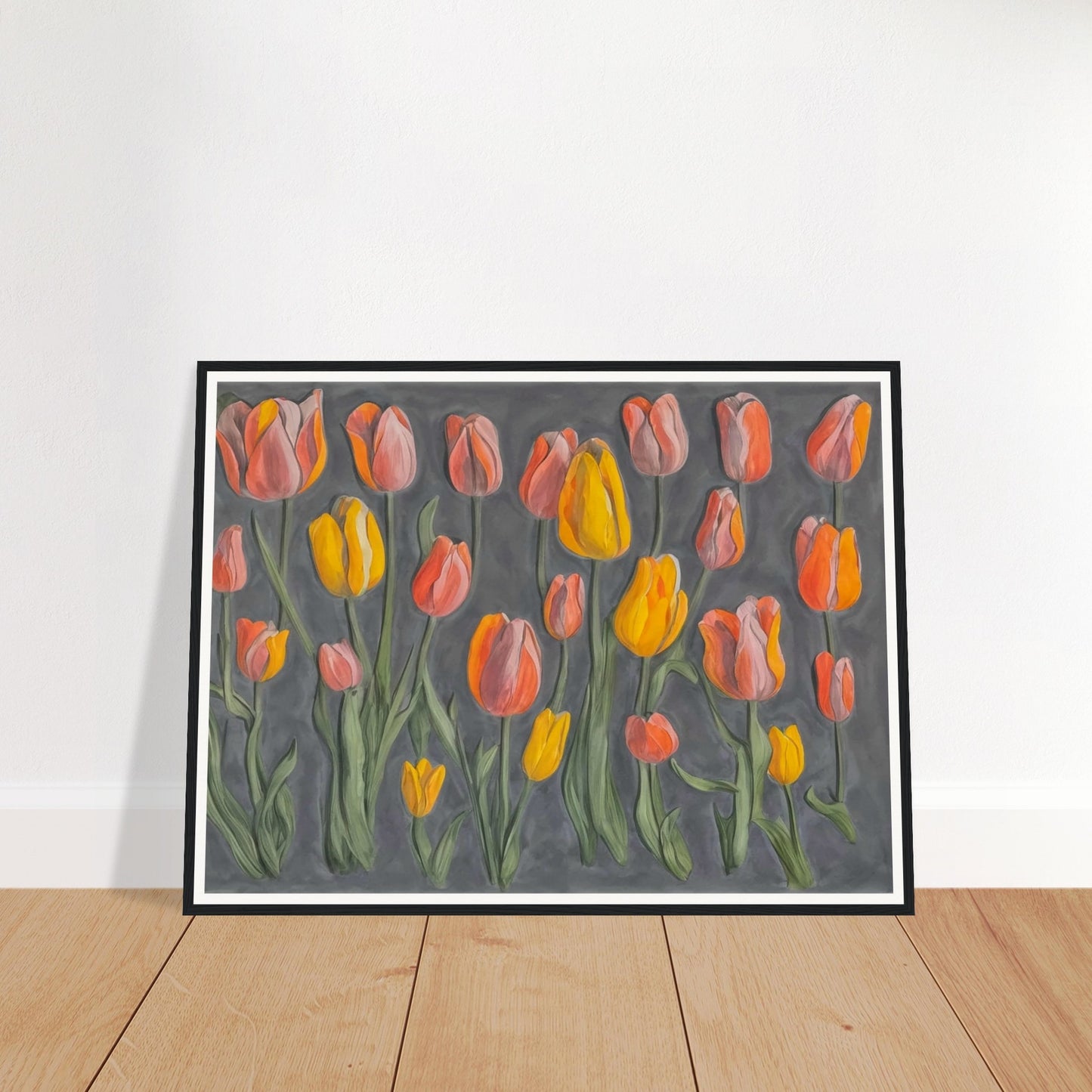 A charming display of orange and yellow tulips standing tall against a muted gray background, showcasing their vibrant colors and graceful stems.