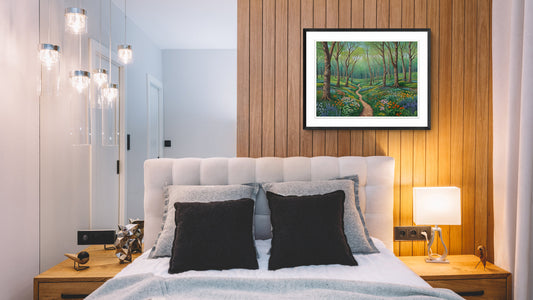 Feng shui bedroom wall art of a lush green forest trail placed above the headboard.jpg
