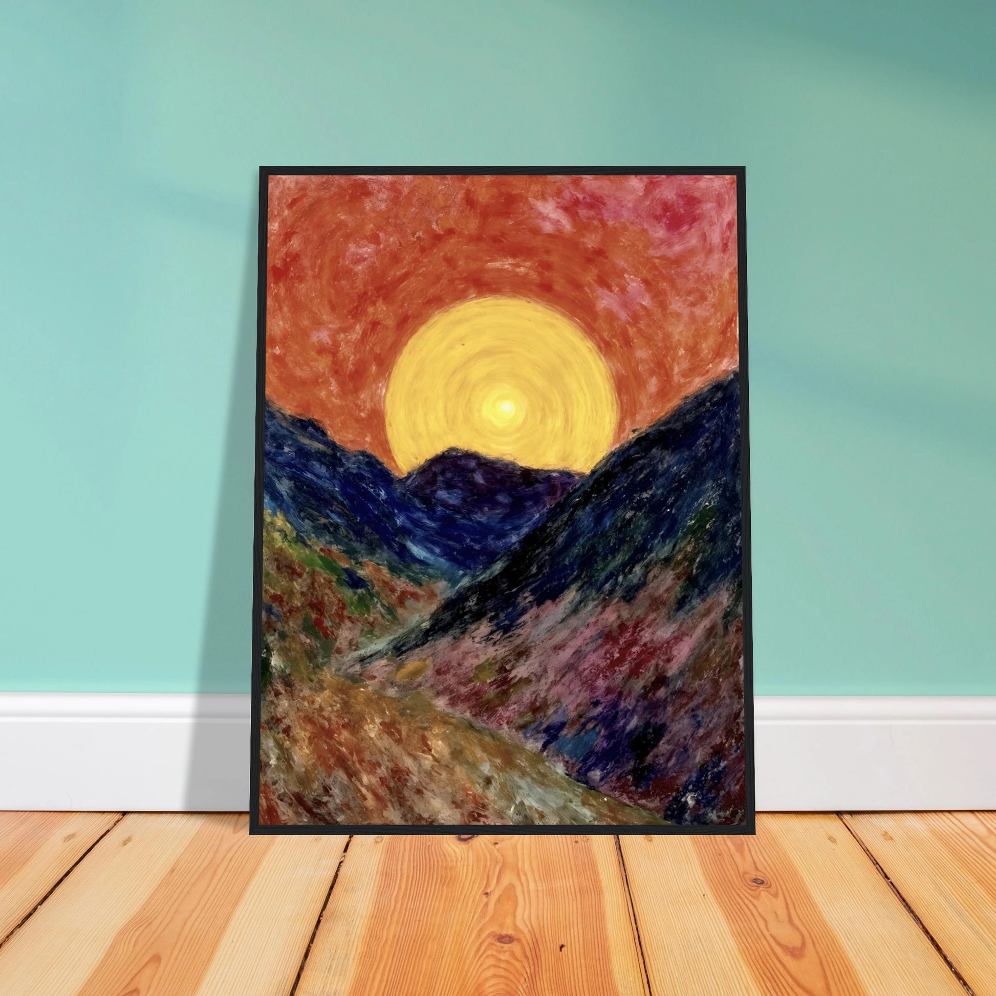 A vivid sunset over deep blue mountains with a glowing golden sun radiating warmth across the textured, colorful valley.