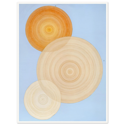 Three overlapping concentric circles in warm orange and beige tones float on a soft blue background like suns in serene orbit.