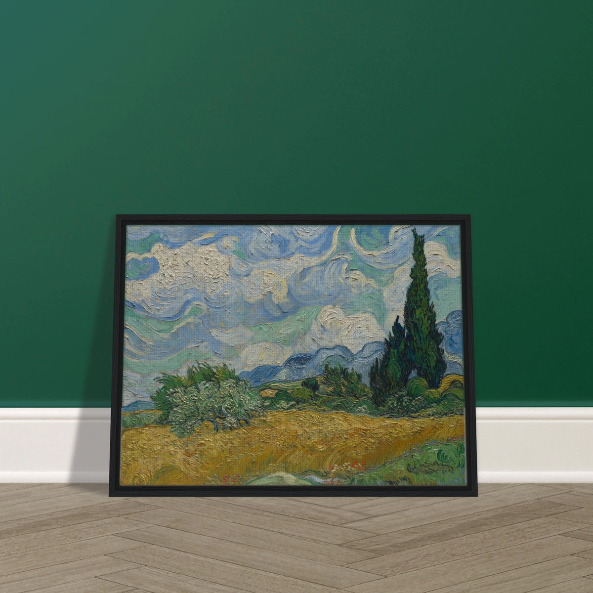 Golden wheat field and dark cypress trees beneath swirling blue-and-white clouds in a vivid Provençal landscape.