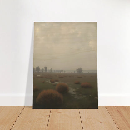 A misty field with distant trees under a pale sky, capturing the quiet stillness of a fog-laden morning.