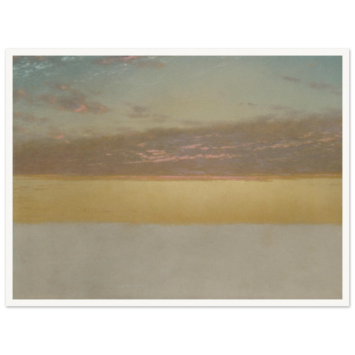 Soft sunset over calm sea with yellow horizon, blue sky, and pink clouds