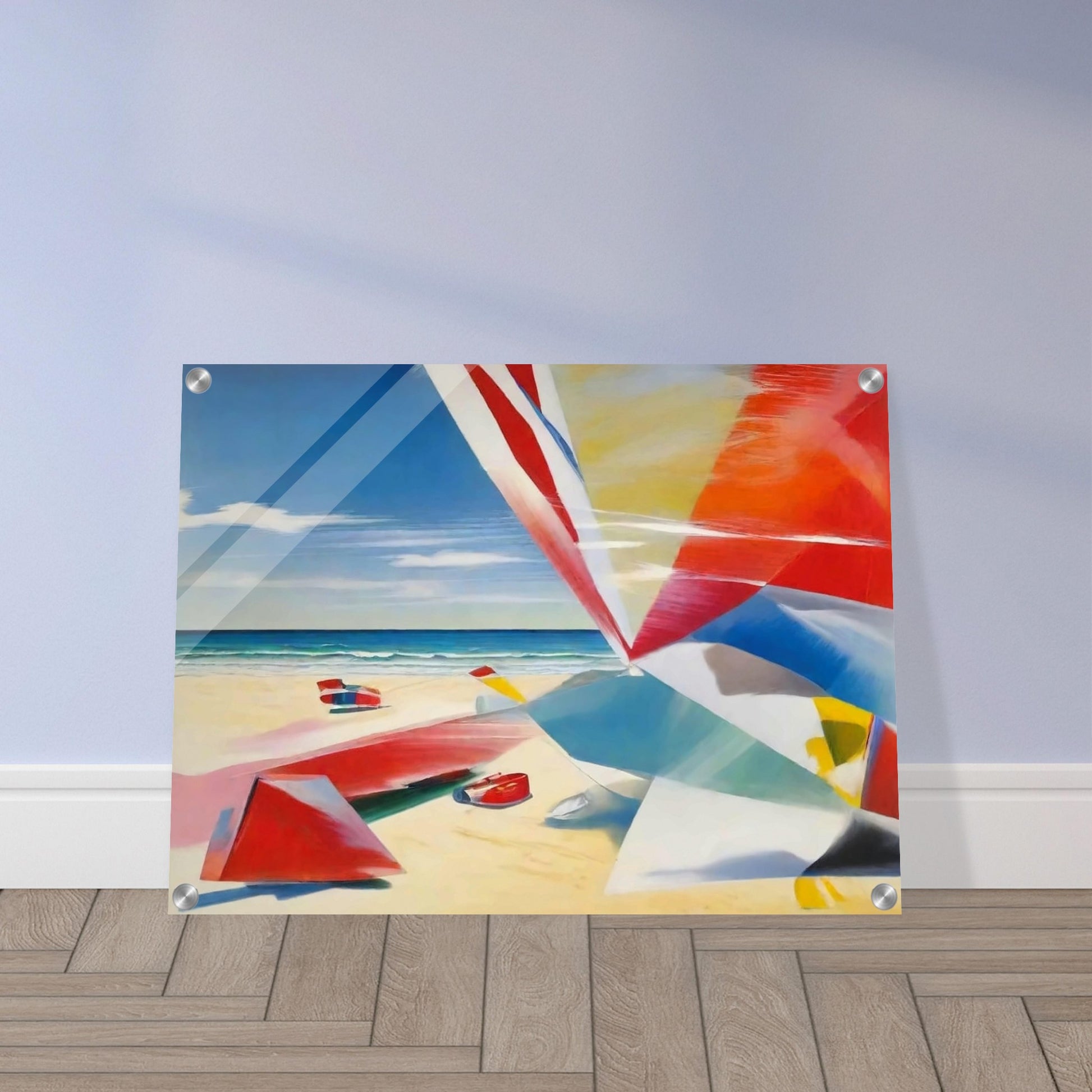 "A colorful beach scene with abstract geometric shapes in red, blue, and yellow on the sand, with a clear sky and calm ocean."