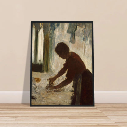 A woman leans over a table ironing white fabric, silhouetted against a softly lit laundry interior.