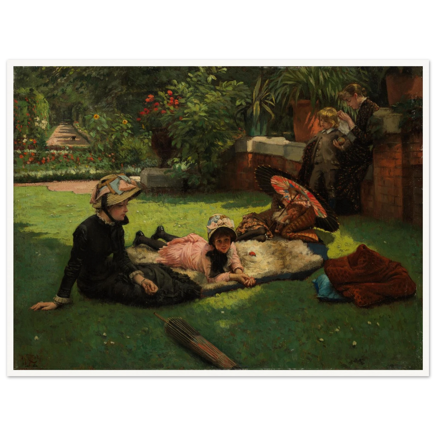Children and women lounge in a garden with a colorful parasol under bright sunlight
