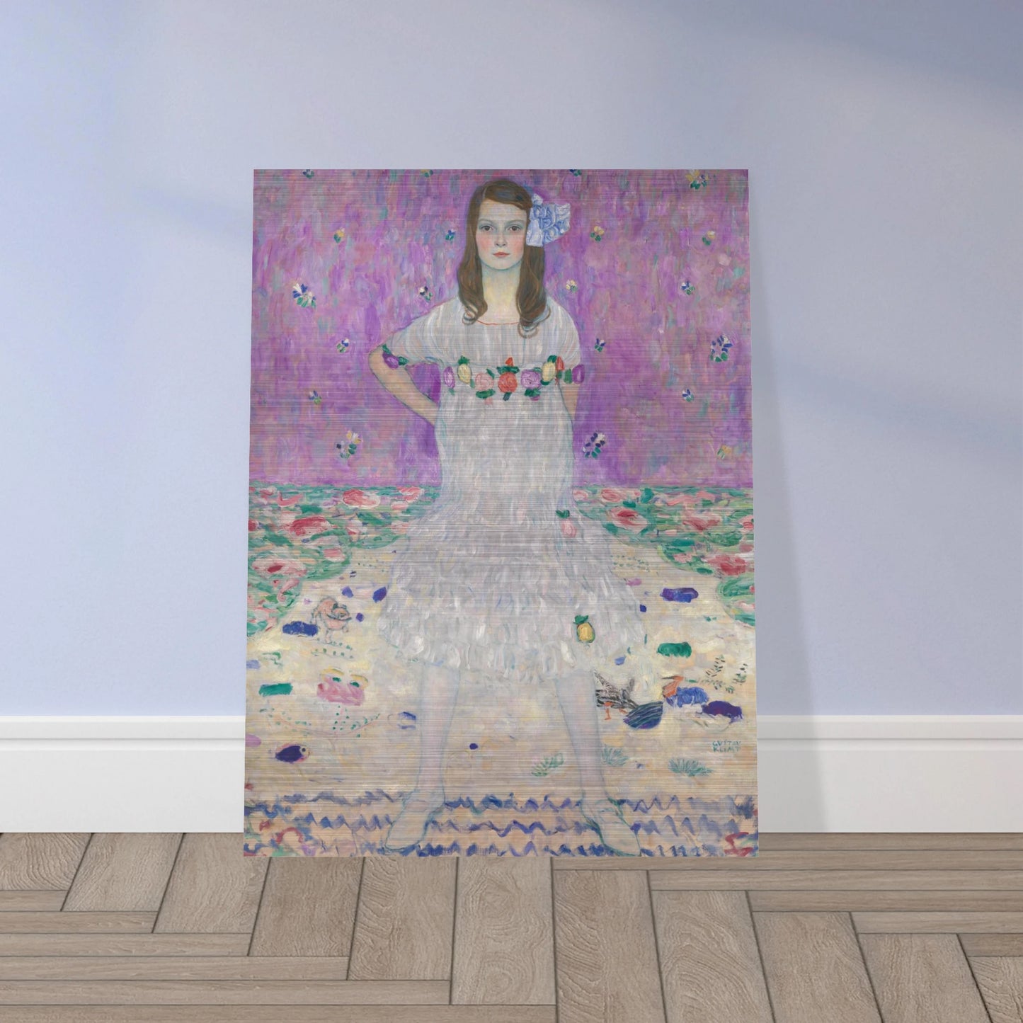 Young girl in a white floral dress stands against a pink patterned background