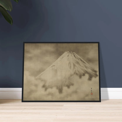 Snow-covered Mount Fuji rises through misty clouds in a soft monochrome Japanese landscape.