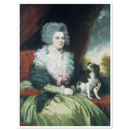 Woman in a green dress sits beside a small black and white dog in a formal portrait