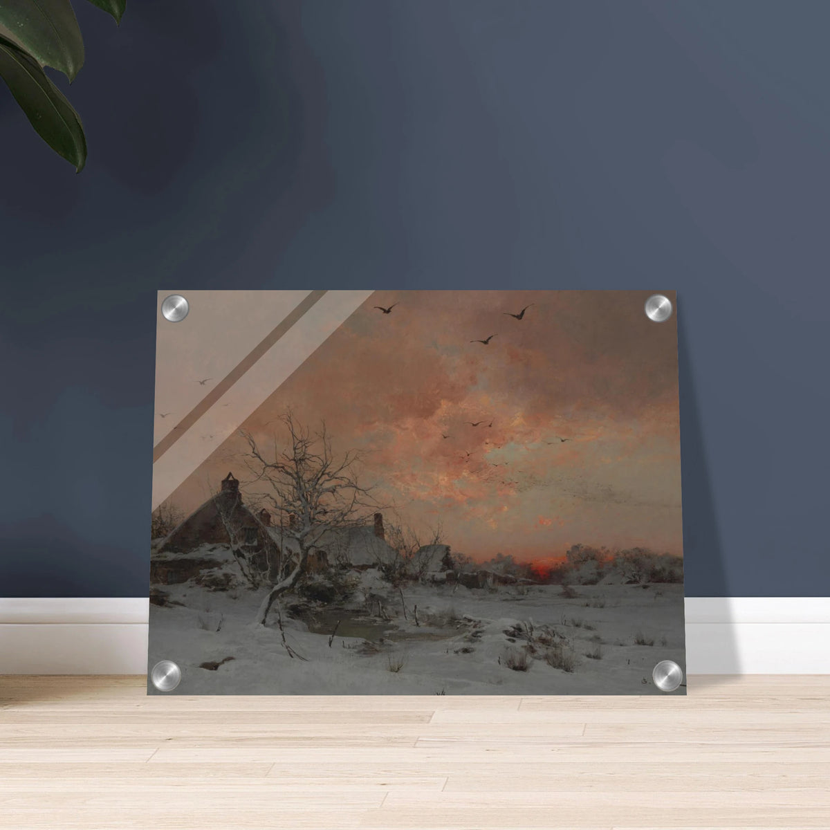 A snowy village at sunset with bare trees, birds in flight, and a pink-orange winter sky.