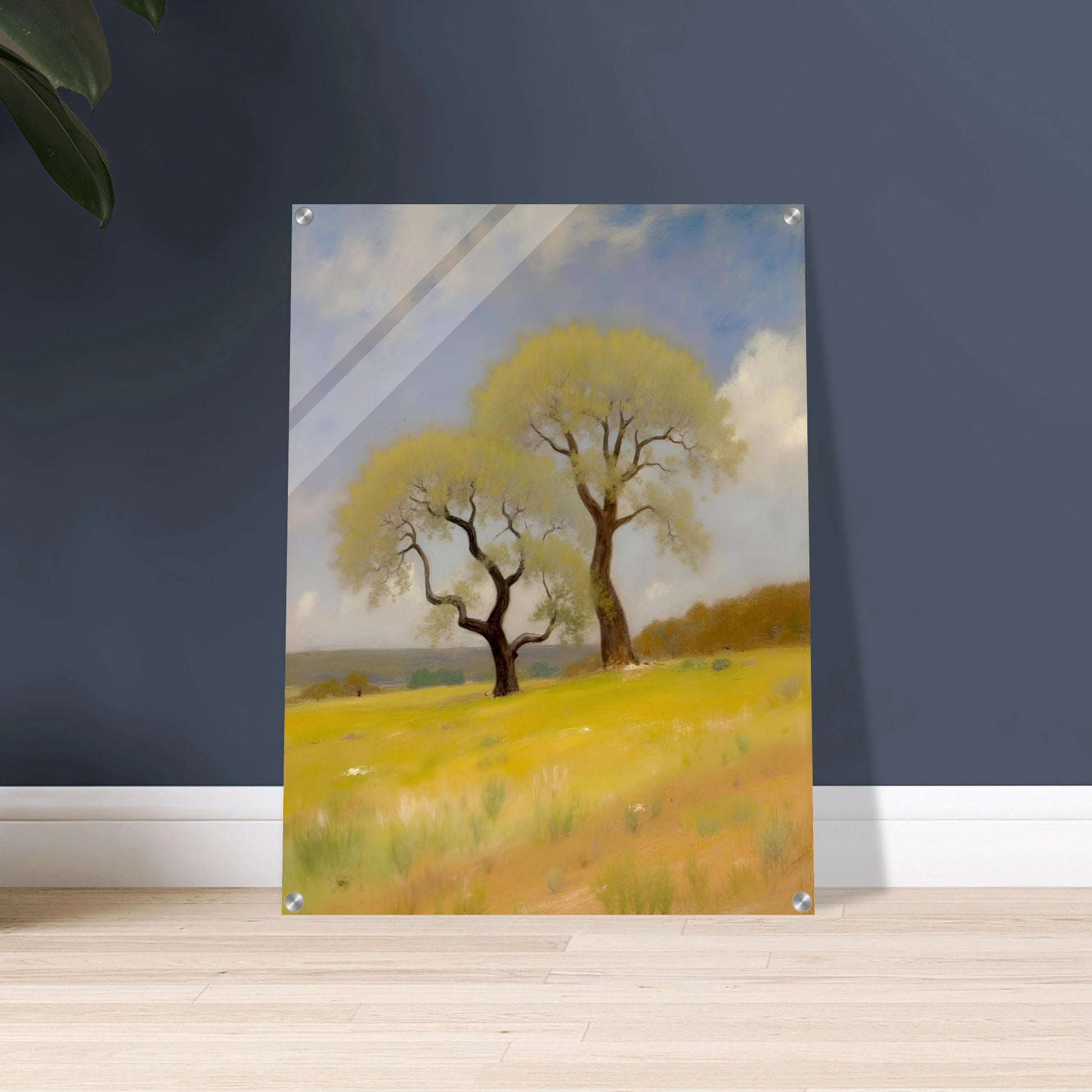 Two softly curved trees rise from a sunlit yellow-green field under a partly cloudy blue sky, evoking peace and resilience.