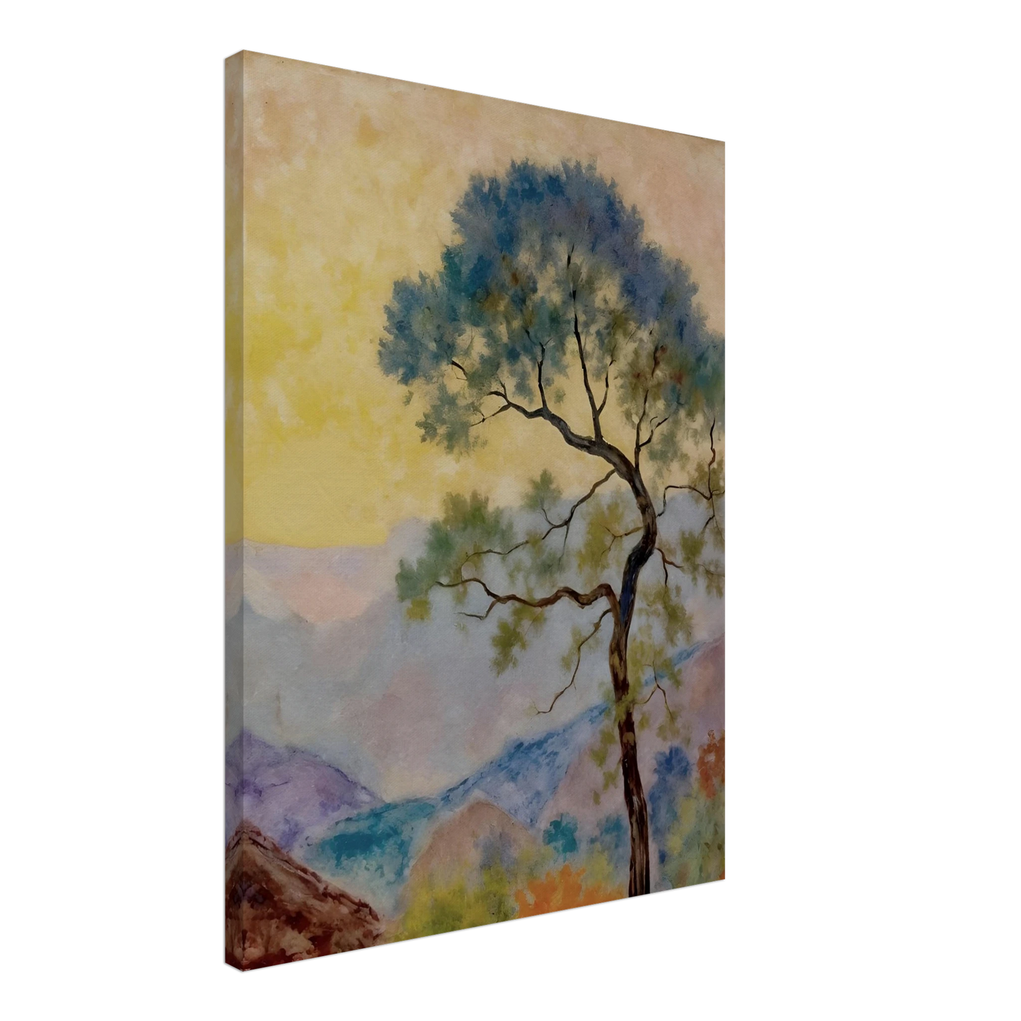 Delicate tree with green-blue foliage standing before pastel mountains under a soft yellow dawn sky.
