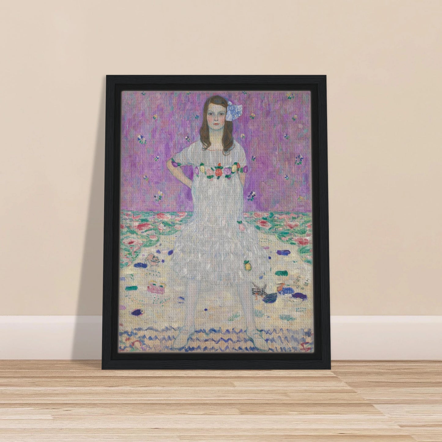 Young girl in a white floral dress stands against a pink patterned background