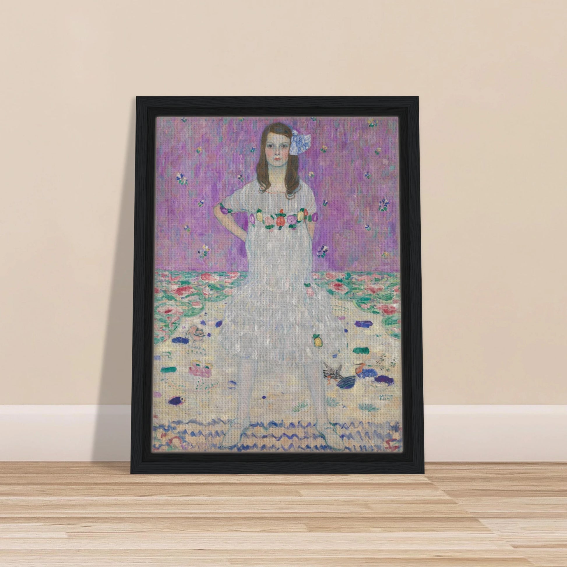 Young girl in a white floral dress stands against a pink patterned background