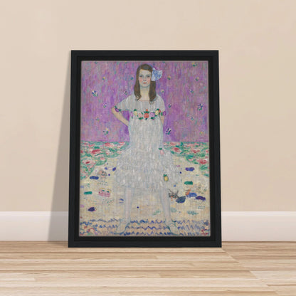 Young girl in a white floral dress stands against a pink patterned background