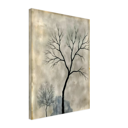 Two leafless trees stand silhouetted against a misty gray sky, evoking a quiet, contemplative atmosphere.