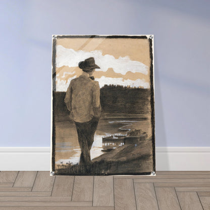 Young man in a hat stands by a riverbank, looking toward clouds and distant water