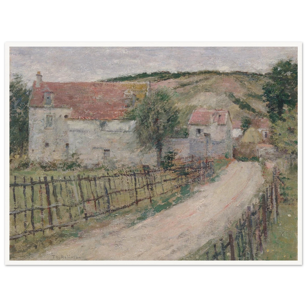 Country road curves past white village houses and fences toward a hill under a pale cloudy sky.