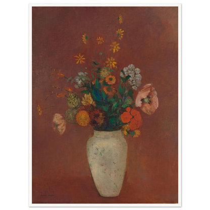 Flowers in a white vase against a red background with yellow and orange blooms