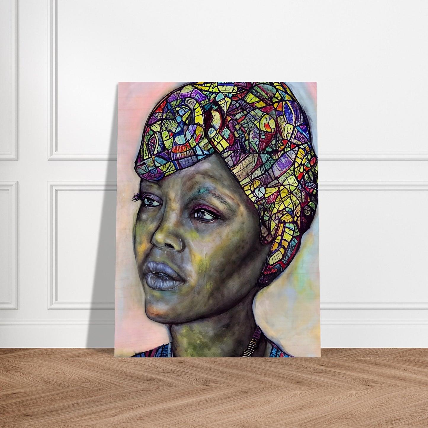 A striking portrait of a woman with a vibrant, mosaic-patterned headwrap, deep expressive eyes, and a contemplative gaze against a soft-toned background.