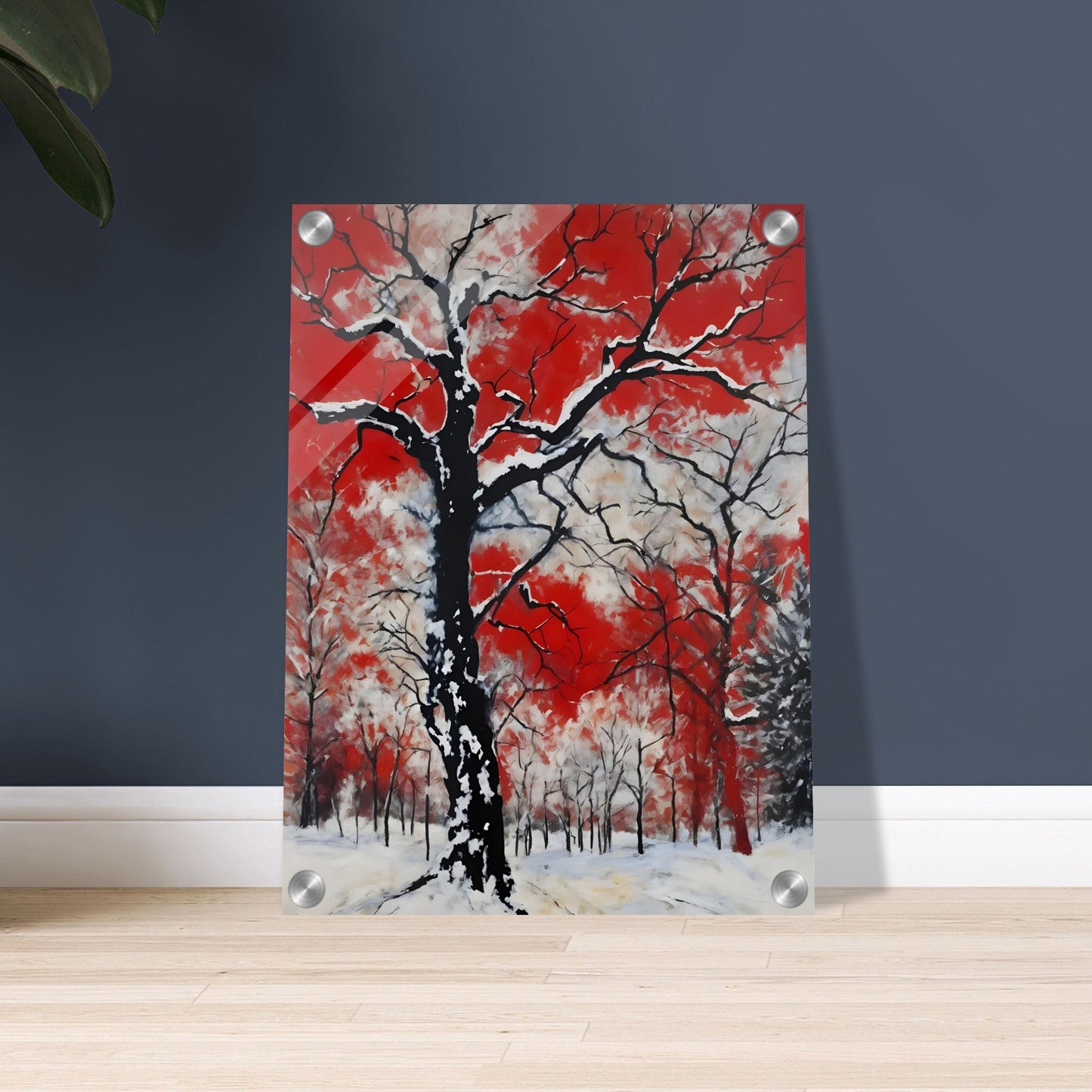 Snow-draped black tree branches standing stark against a vivid red and white sky, evoking a fiery yet wintry contrast.