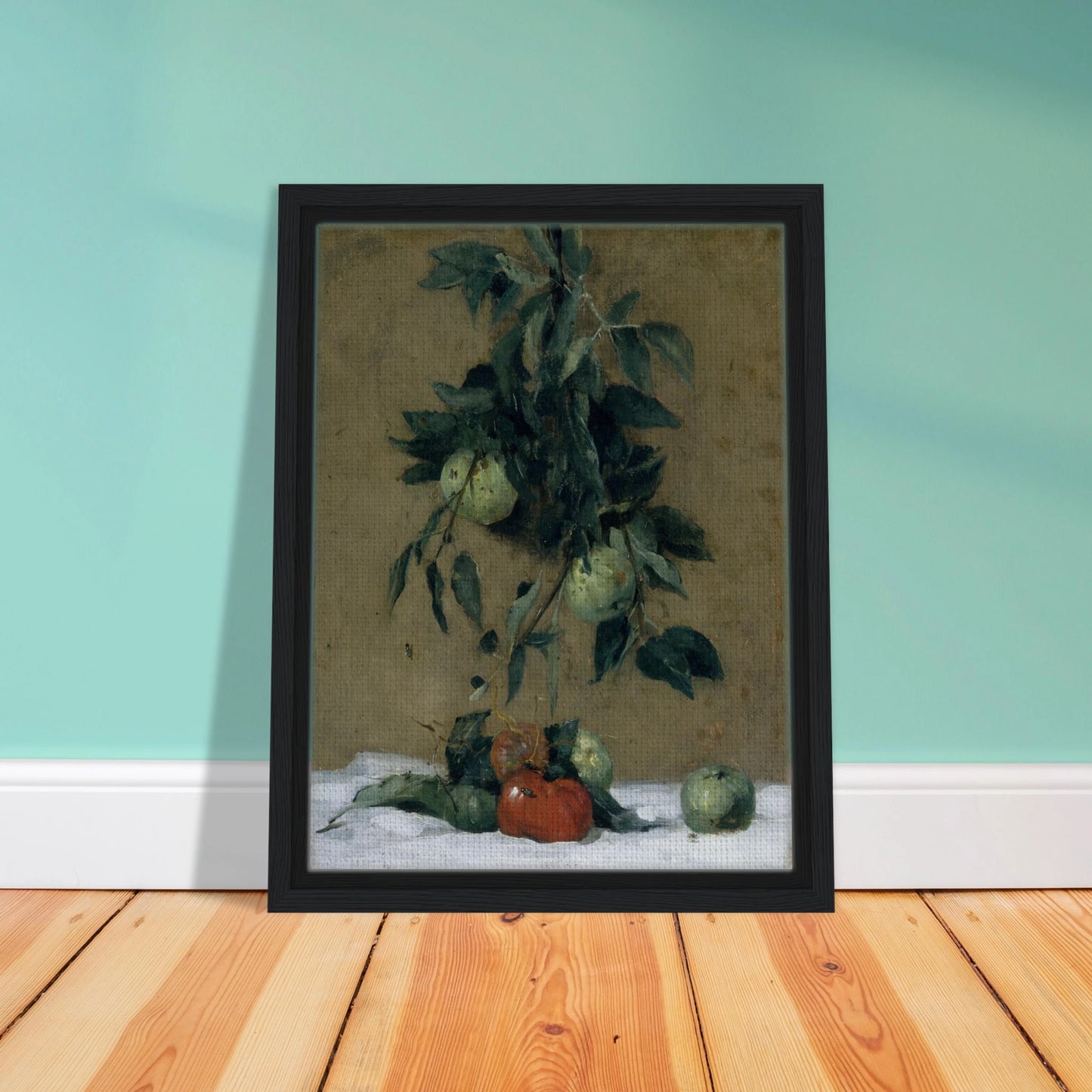 Apples and leaves hang above red fruit on a white cloth in a muted still life