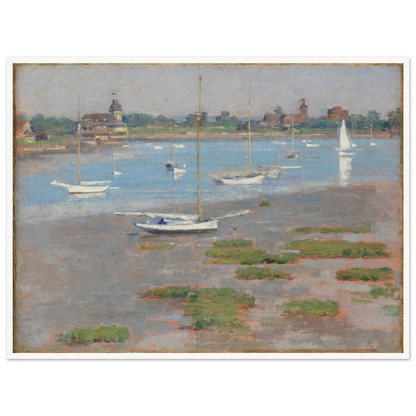 Sailboats rest at low tide near Riverside Yacht Club under hazy blue skies