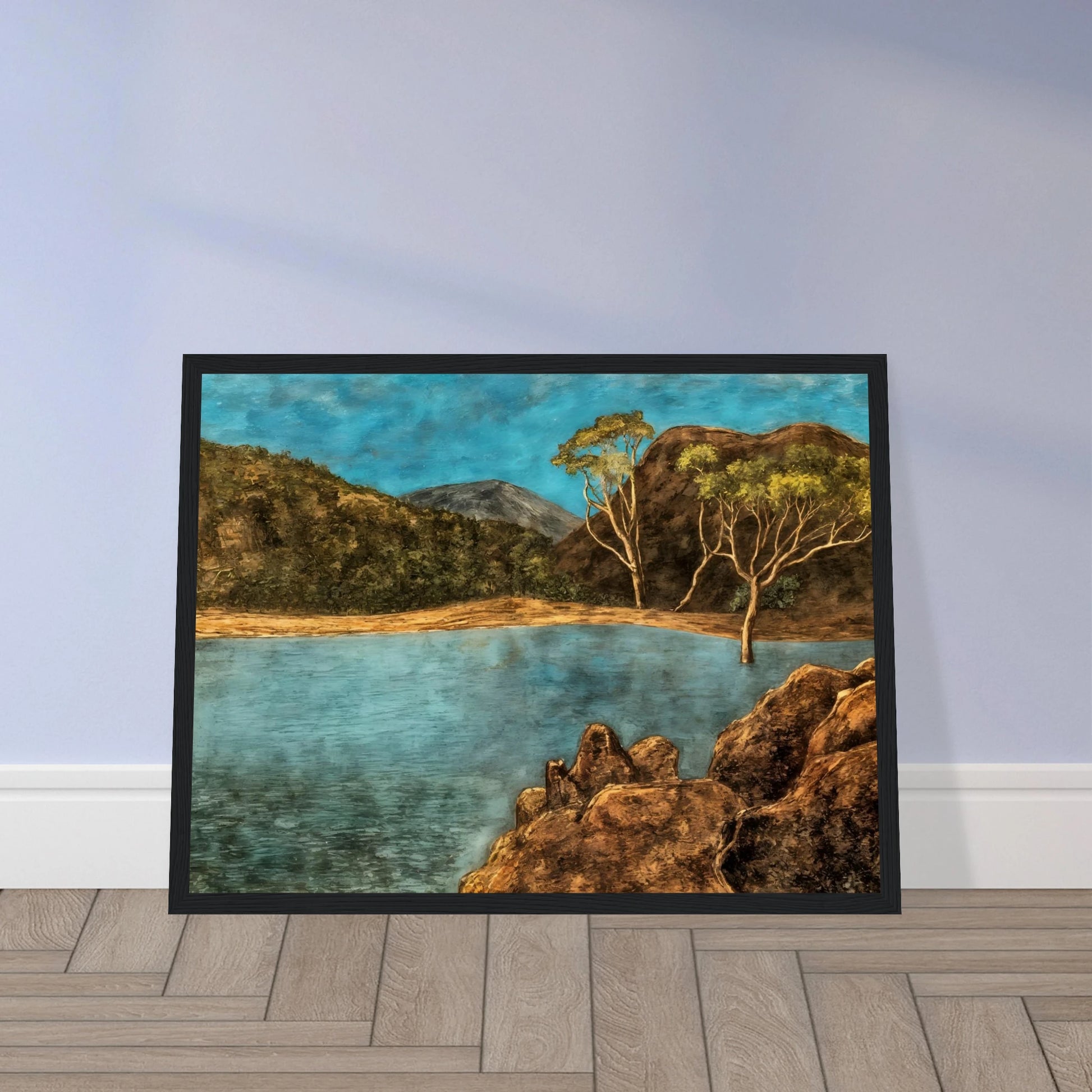 Blue lake with rocky shore, brown hills, slender trees, and turquoise sky in a quiet landscape.