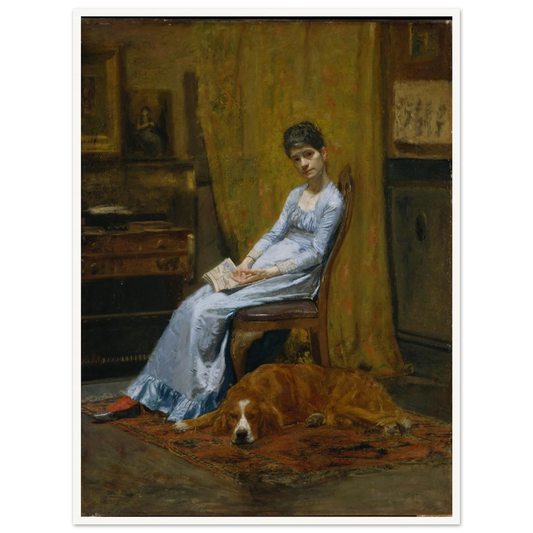 Woman in a blue dress sits with papers beside a sleeping setter dog in a dim studio interior.