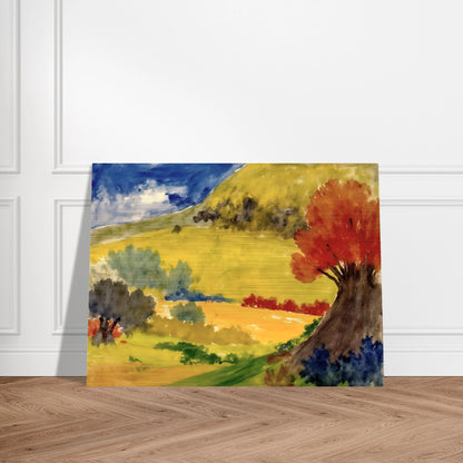 Red tree rises beside golden hills, green fields, and a deep blue sky in a bright countryside scene.