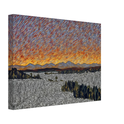 Vibrant orange sunset over distant mountains with textured sky and patterned fields in the foreground.