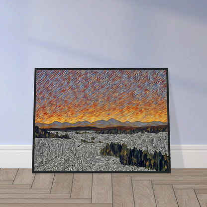 Vibrant orange sunset over distant mountains with textured sky and patterned fields in the foreground.