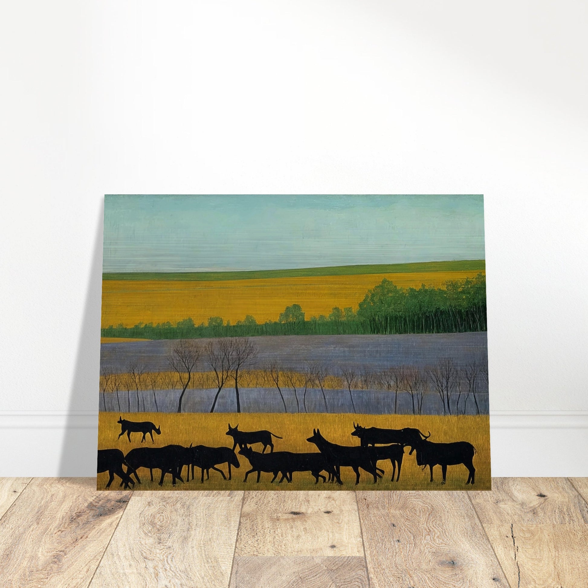 A peaceful scene of black cattle walking across golden fields, with green trees and a clear blue sky in the distance.