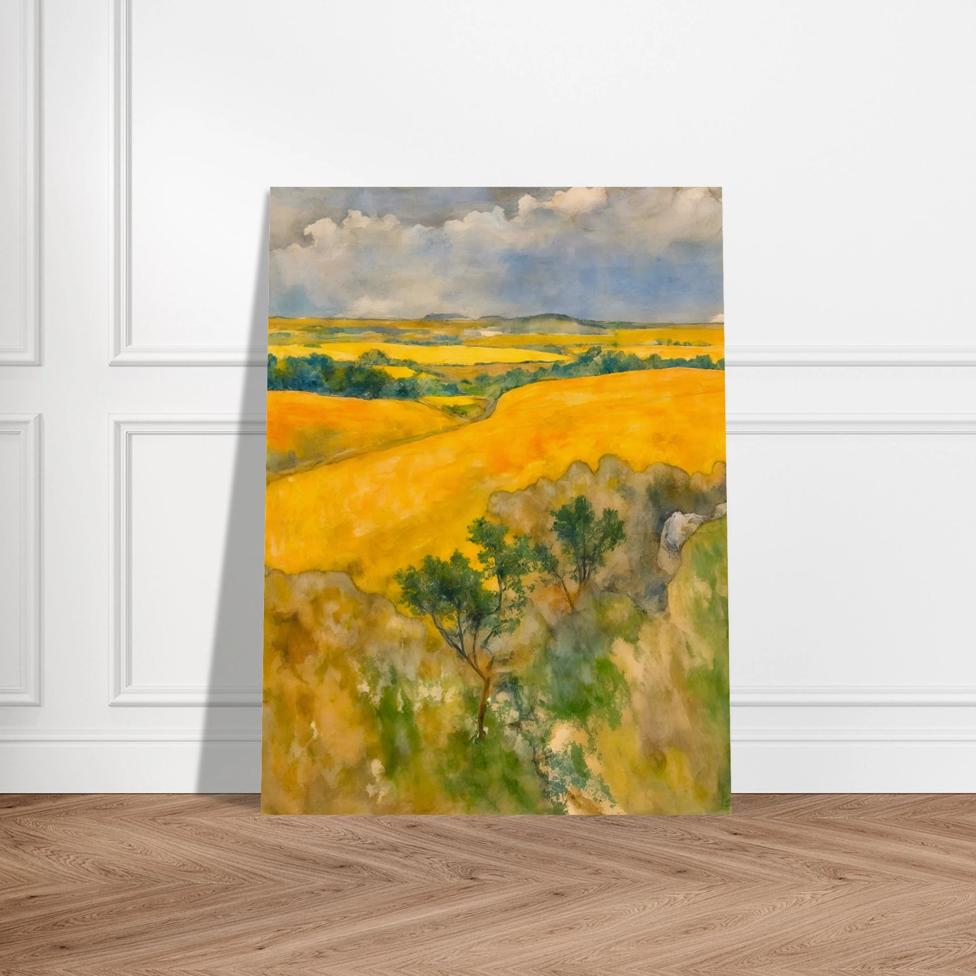 Golden fields stretch across rolling hills under a blue and cloudy sky, with trees dotting the lush summer landscape.